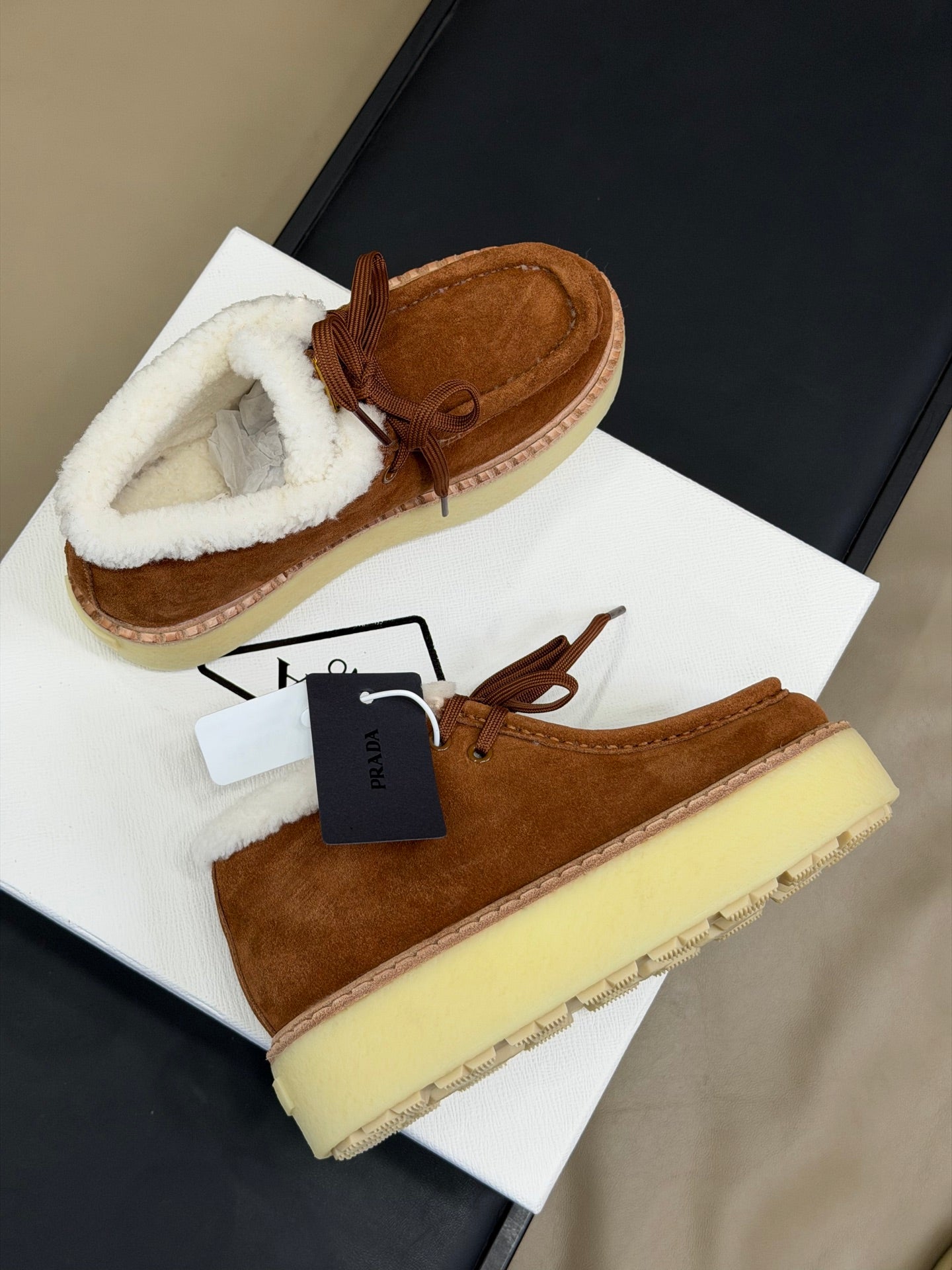 PRADA 25S HIGH-TOP SHOES 40 MM IN DARK BROWN SUEDE SHEARLING-LINED