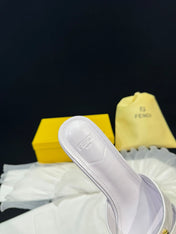 FENDI MEDIUM-HEELED 55 MM MULE IN WHITE LAMBSKIN WITH GOLD HARDWARE