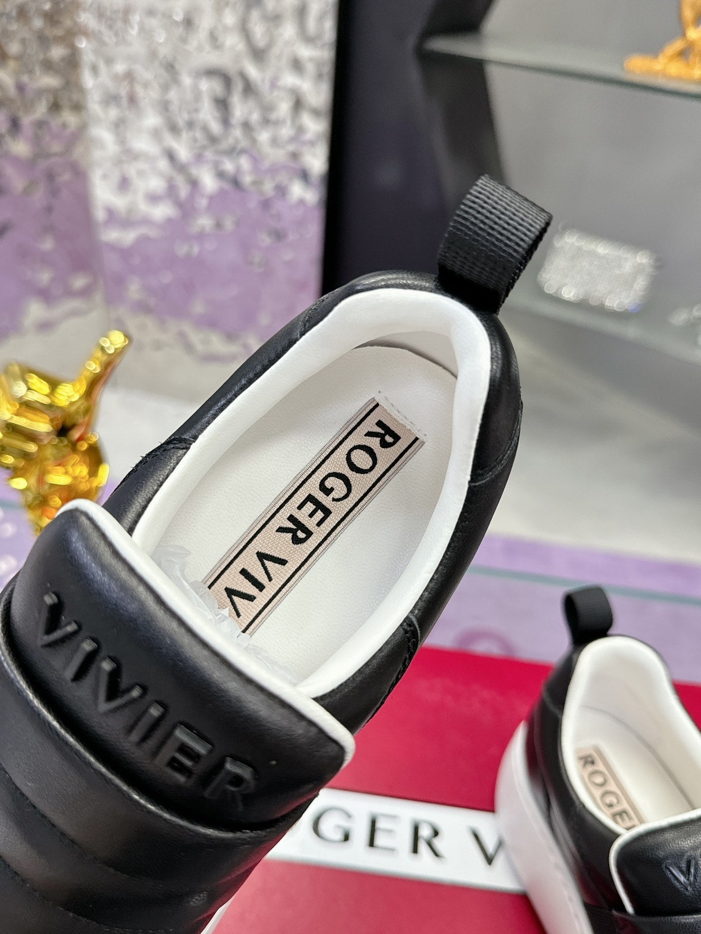 PUFFY LEATHER LOW TOP SNEAKERS IN BLACK LAMBSKIN