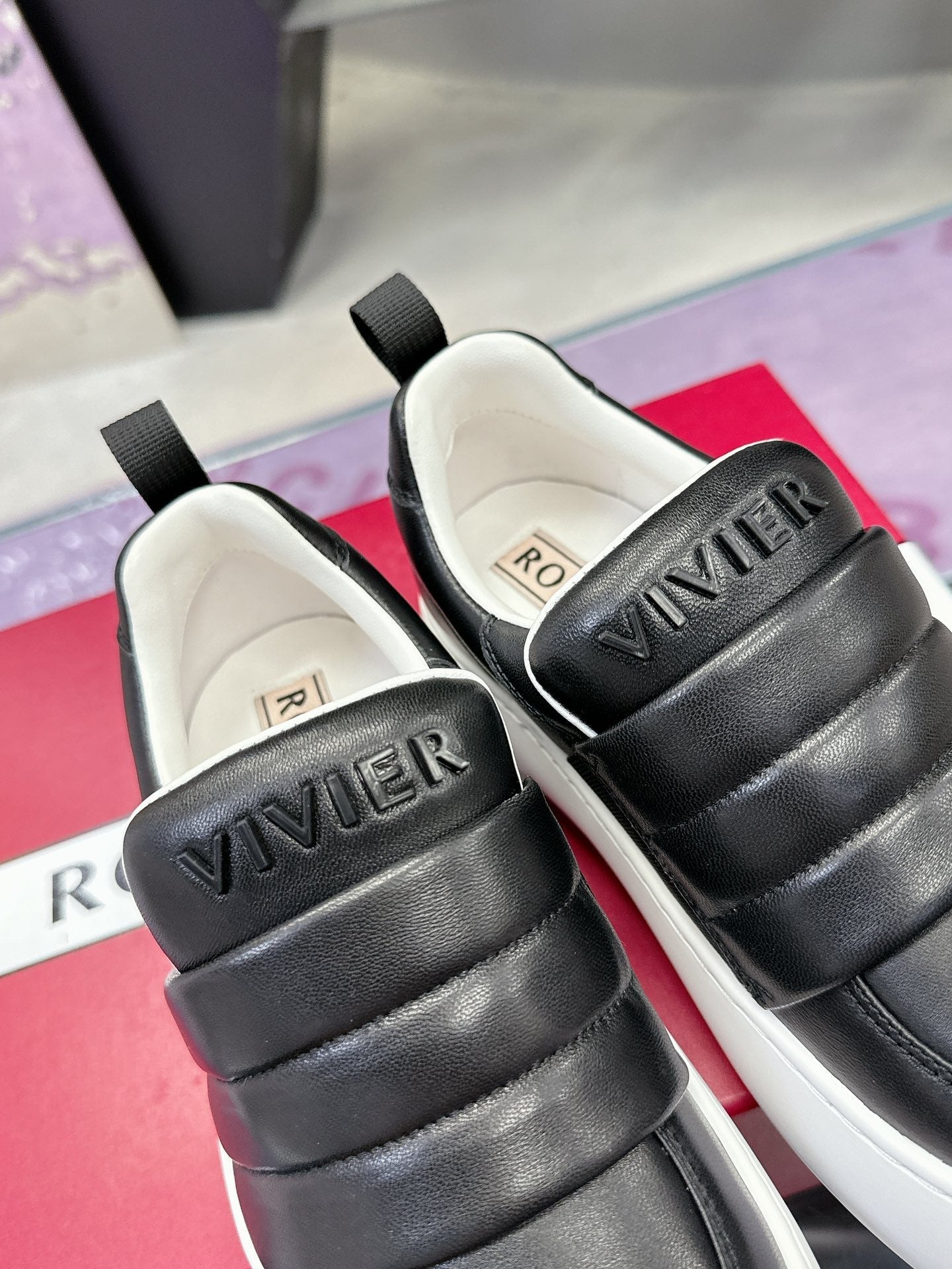 PUFFY LEATHER LOW TOP SNEAKERS IN BLACK LAMBSKIN