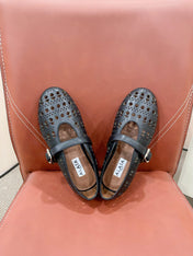 ALAIA HOLLOW BALLET FLAT IN BLACK LAMBSKIN