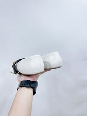 ALAIA MARY JANE SHOES IN WHITE LAMBSKIN WITH GOLD HARDWARE