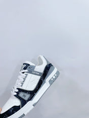 LV TRAINER SNEAKER IN WHITE CALFSKIN AND BLACK MONOGRAM DENIM