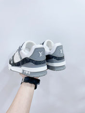 LV TRAINER SNEAKER IN WHITE CALFSKIN AND BLACK MONOGRAM DENIM