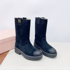 THICK-SOLED BOOTS IN BLACK SUEDE