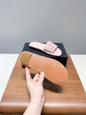 ALAIA FLAT SANDALS WITH PERFORATED STRAPS 25S IN LIGHT PINK SUEDE