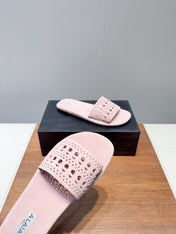 ALAIA FLAT SANDALS WITH PERFORATED STRAPS 25S IN LIGHT PINK SUEDE