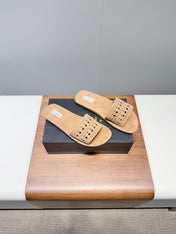 ALAIA FLAT SANDALS WITH PERFORATED STRAPS 25S IN BEIGE SUEDE