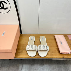 FLAT SLIDE IN WHITE CALFSKIN