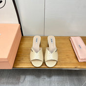 JEWELLED HEEL 55 MULE SANDALS IN PALE YELLOW CALFSKIN