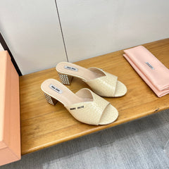 JEWELLED HEEL 55 MULE SANDALS IN PALE YELLOW CALFSKIN