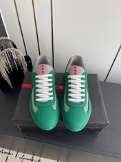 PRADA 26S AMERICA CUP SNEAKERS IN TEAL GREEN SOFT RUBBER AND BIKE FABRIC