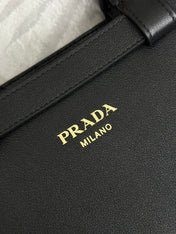 PRADA 25S BUCKLE MEDIUM HANDBAG 28 IN BLACK CALFSKIN GOLD HARDWRE