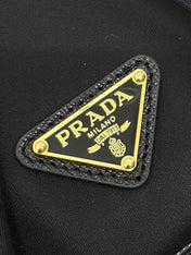 BUCKET BAG 19 IN BLACK RE-NYLON AND CALFSKIN HANDLE