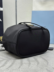 BUCKET BAG 19 IN BLACK RE-NYLON AND CALFSKIN HANDLE