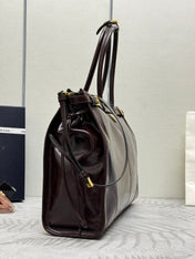 PRADA 25S BONNIE EXTRA-LARGE 42 IN DARK BROWN GLOSSY CALFSKIN GOLD HARDWARE