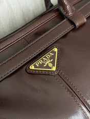 PRADA 25S BONNIE EXTRA-LARGE 42 IN DARK BROWN GLOSSY CALFSKIN GOLD HARDWRE
