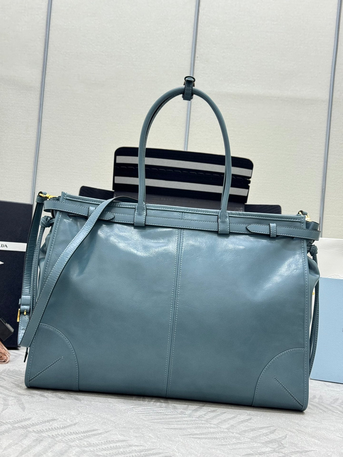 PRADA 25S LUX SOFT BAG 42 IN BLUE GLOSSY CALFSKIN GOLD HARDWARE