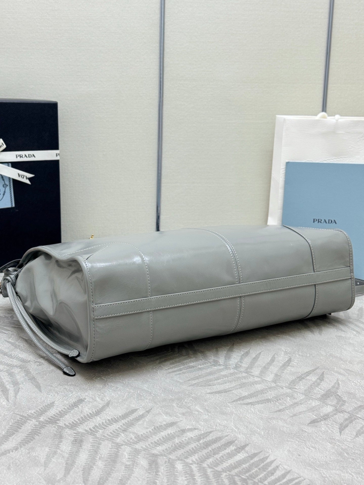 PRADA 25S LUX SOFT BAG 42 IN GRAY GLOSSY CALFSKIN GOLD HARDWRE