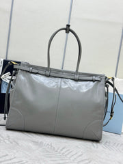 PRADA 25S LUX SOFT BAG 42 IN GRAY GLOSSY CALFSKIN GOLD HARDWRE