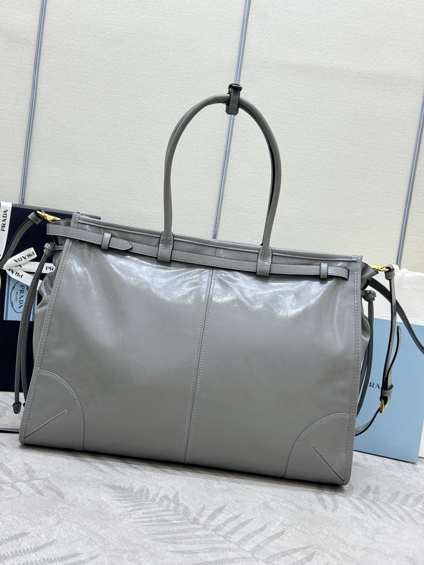 PRADA 25S LUX SOFT BAG 42 IN GRAY GLOSSY CALFSKIN GOLD HARDWARE