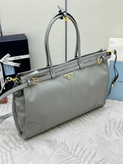 PRADA 25S LUX SOFT BAG 42 IN GRAY GLOSSY CALFSKIN GOLD HARDWARE