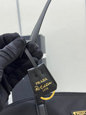 PRADA 25S RE-EDITION 1978 MEDIUM 35 IN BLACK NYLON AND SAFFIANO CALFSKIN