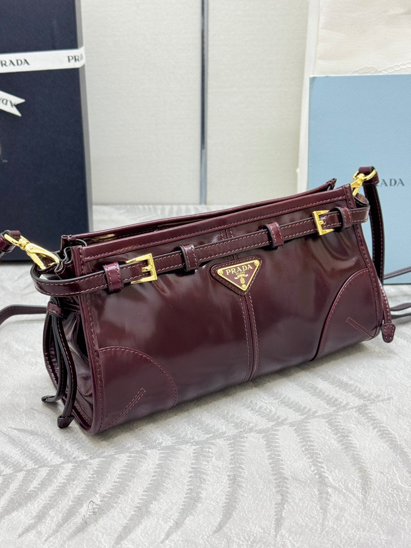 PRADA 25S BONNIE SMALL SHOULDER BAG 26 IN BURGUNDY GLOSSY CALFSKIN GOLD HARDWARE