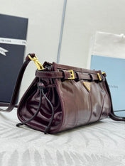PRADA 25S BONNIE SMALL SHOULDER BAG 26 IN BURGUNDY GLOSSY CALFSKIN GOLD HARDWARE