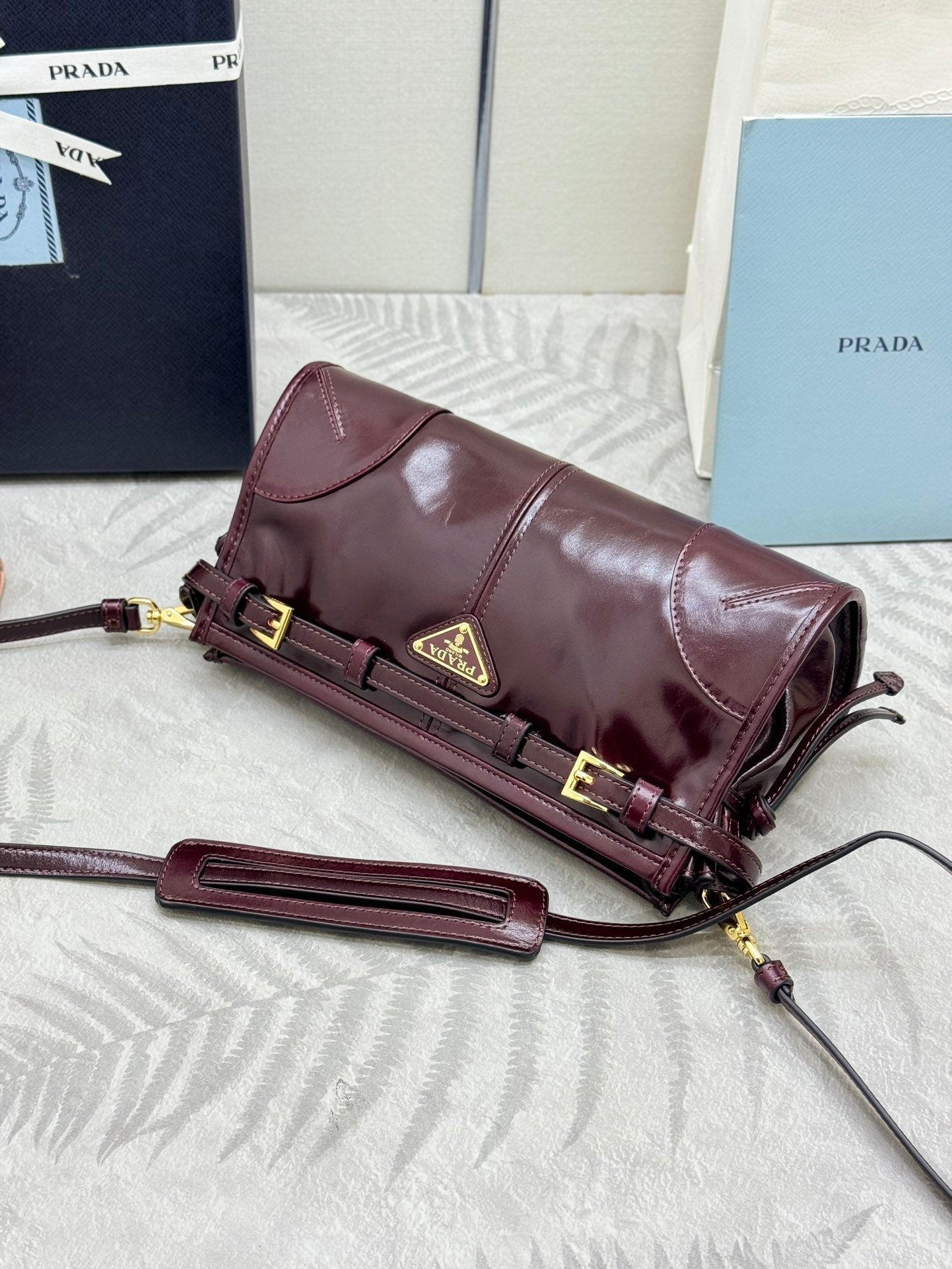 PRADA 25S BONNIE SMALL SHOULDER BAG 26 IN BURGUNDY GLOSSY CALFSKIN GOLD HARDWARE