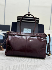 PRADA 25S BONNIE LARGE HANDBAG 38 IN BURGUNDY GLOSSY CALFSKIN GOLD HARDWARE