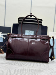 PRADA 25S BONNIE LARGE HANDBAG 38 IN BURGUNDY GLOSSY CALFSKIN GOLD HARDWARE
