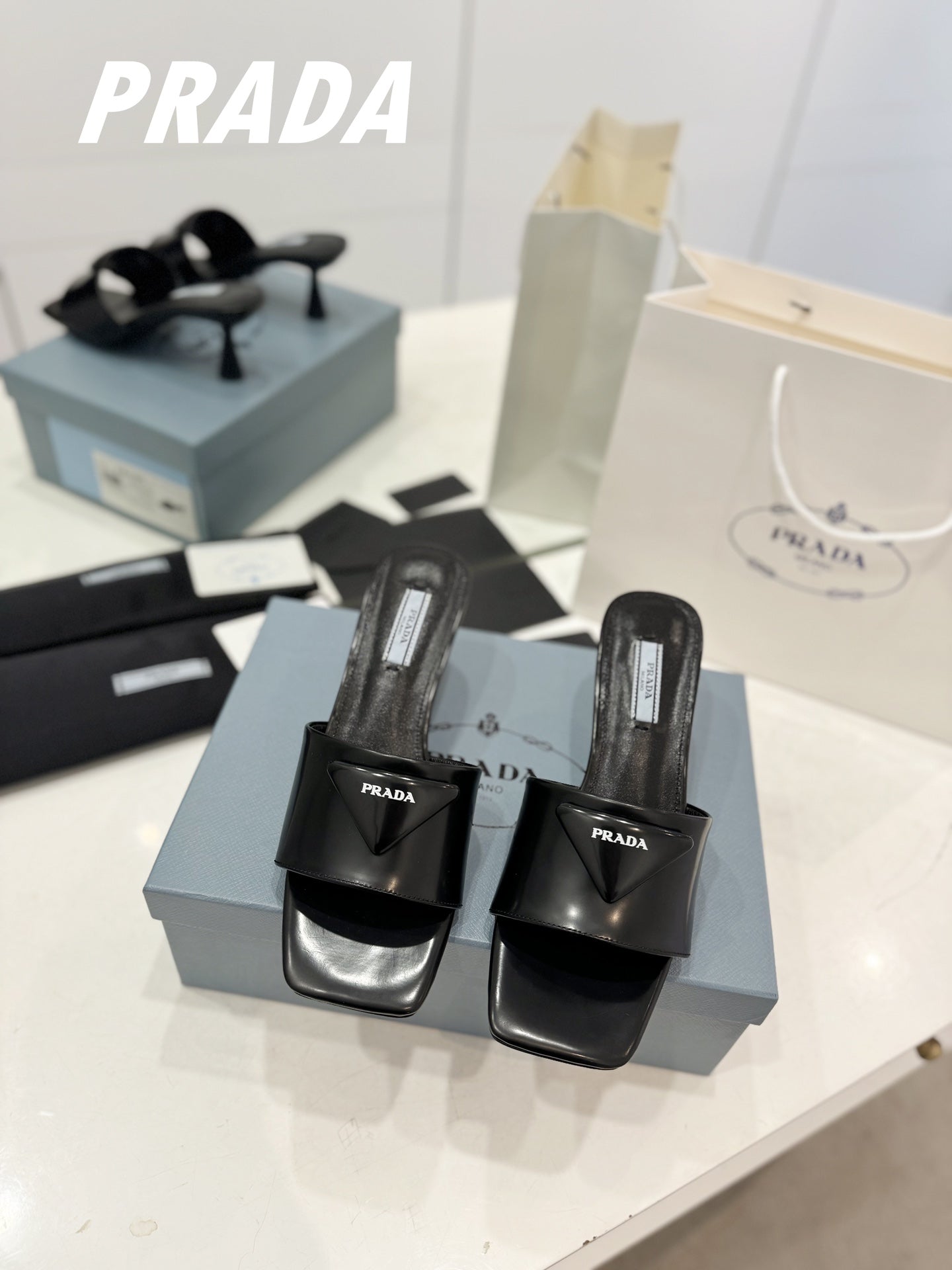 PRA BRUSHED LEATHER HEELED SLIDES BLACK