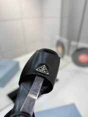 PRADA 26S HEELED SANDALS 115MM IN BLACK CALFSKIN WITH LOGO