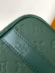 KEEPALL BANDOULIÈRE 25 IN FOREST GREEN MONOGRAM EMBOSSED CALFSKIN