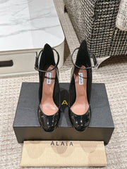 ALAIA ROUND-TOE HIGH HEELS 10 CM IN BLACK CALFSKIN