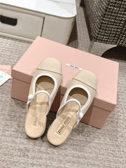 FLAT MULE IN BISQUE BEIGE PATENT CALFSKIN