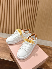MM SNEAKERS IN WHITE CALFSKIN WITH YELLOW LACES
