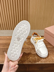 MM SNEAKERS IN WHITE CALFSKIN WITH YELLOW LACES
