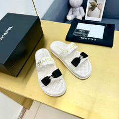 DAD SANDALS WITH BOW IN WHITE LAMBSKIN MULE