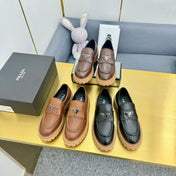 LOAFER WITH TRIANGLE LOGO IN CHOCOLATE BROWN CALFSKIN