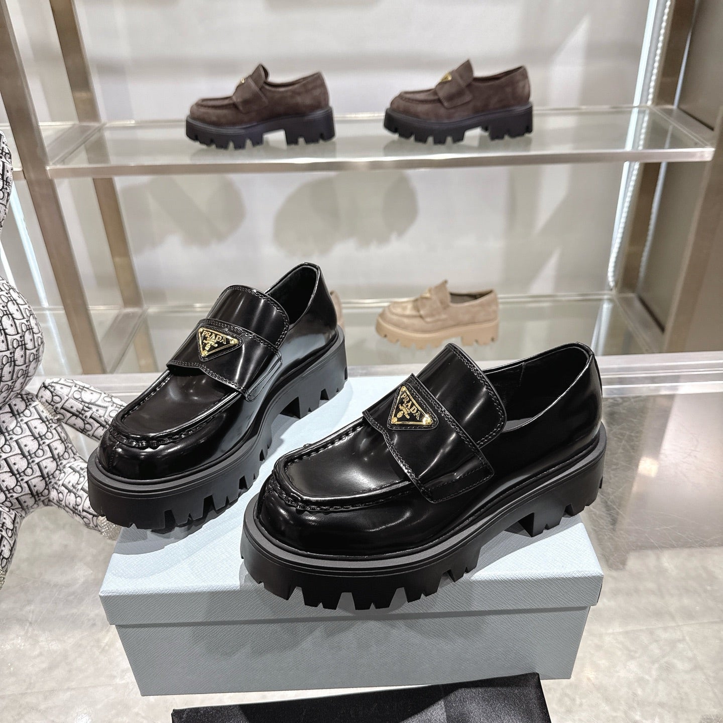 PRADA 25S THICK-SOLE LOAFERS 60 MM IN BLACK CALFSKIN