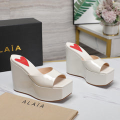 ALAIA PLATFORM WEDGE IN WHITE TAN LAMBSKIN WITH RED HEART
