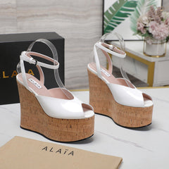ALAIA WEDGE SANDAL IN WHITE GLOSSY CALFSKIN AND BEIGE RUBBER