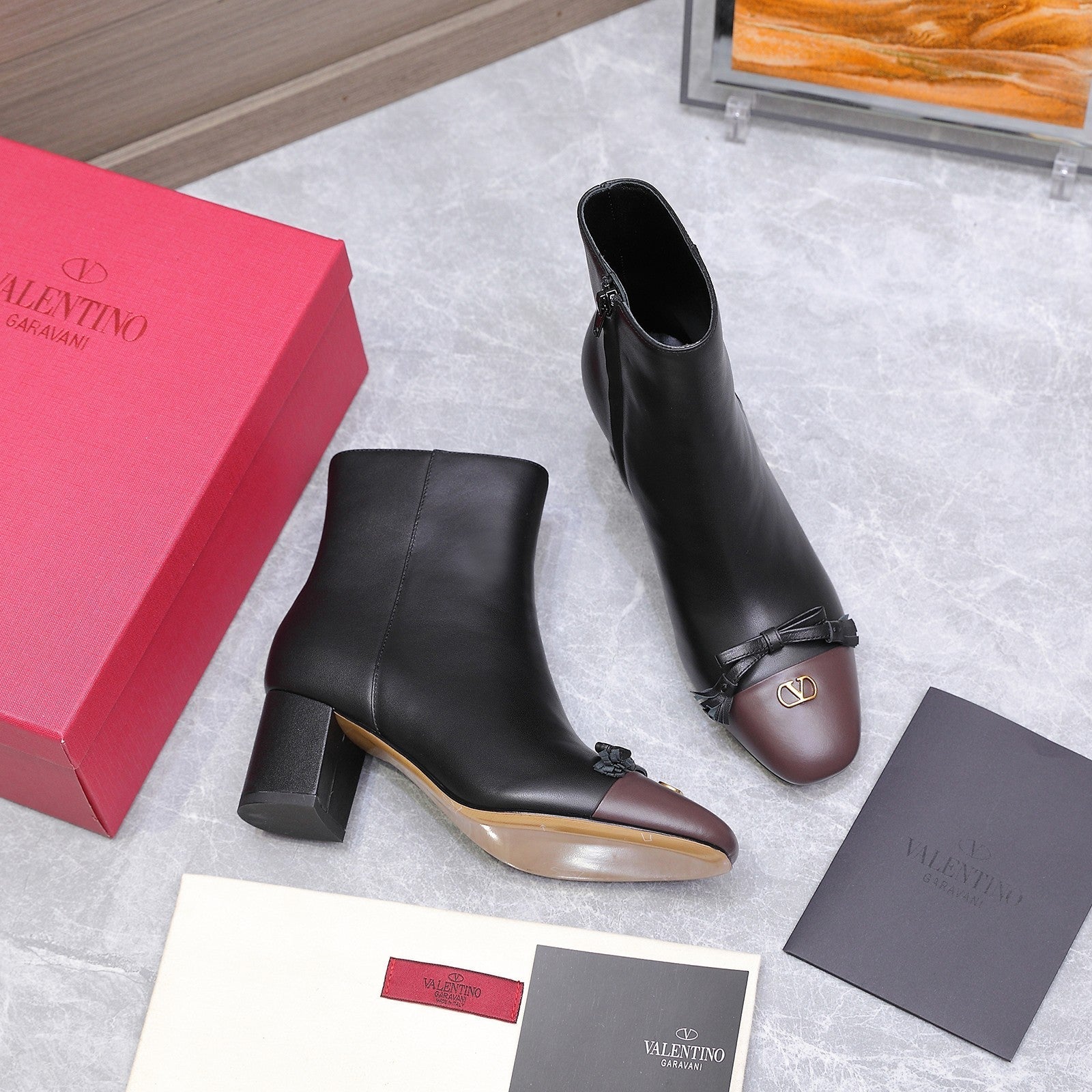 VALENTINO 25S VALET DU ROI ANKLE BOOTS 60 MM IN BLACK MIX DARK BROWN CALFSKIN WITH BOW