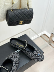 CC FLAT MULES 25SS IN BLACK EMBELLISHED WITH RHINESTONES