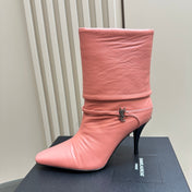 NIKI BOOTIES IN CORAL SHEEPSKIN