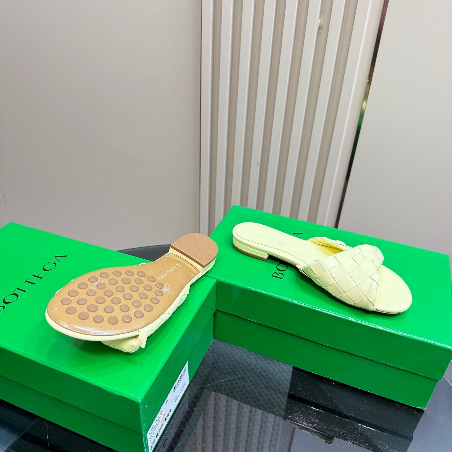 BLINK FLAT MULE IN PASTEL YELLOW INTRECCIATO LEATHER