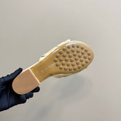 BLINK FLAT MULE IN PALE YELLOW INTRECCIATO LEATHER