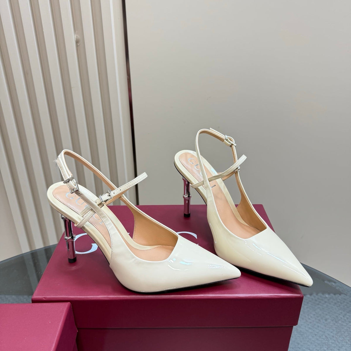 POINTED-TOE HIGH BAMBOO-EFFECT HEEL SLINGBACK IN CREAM PATENT CALFSKIN